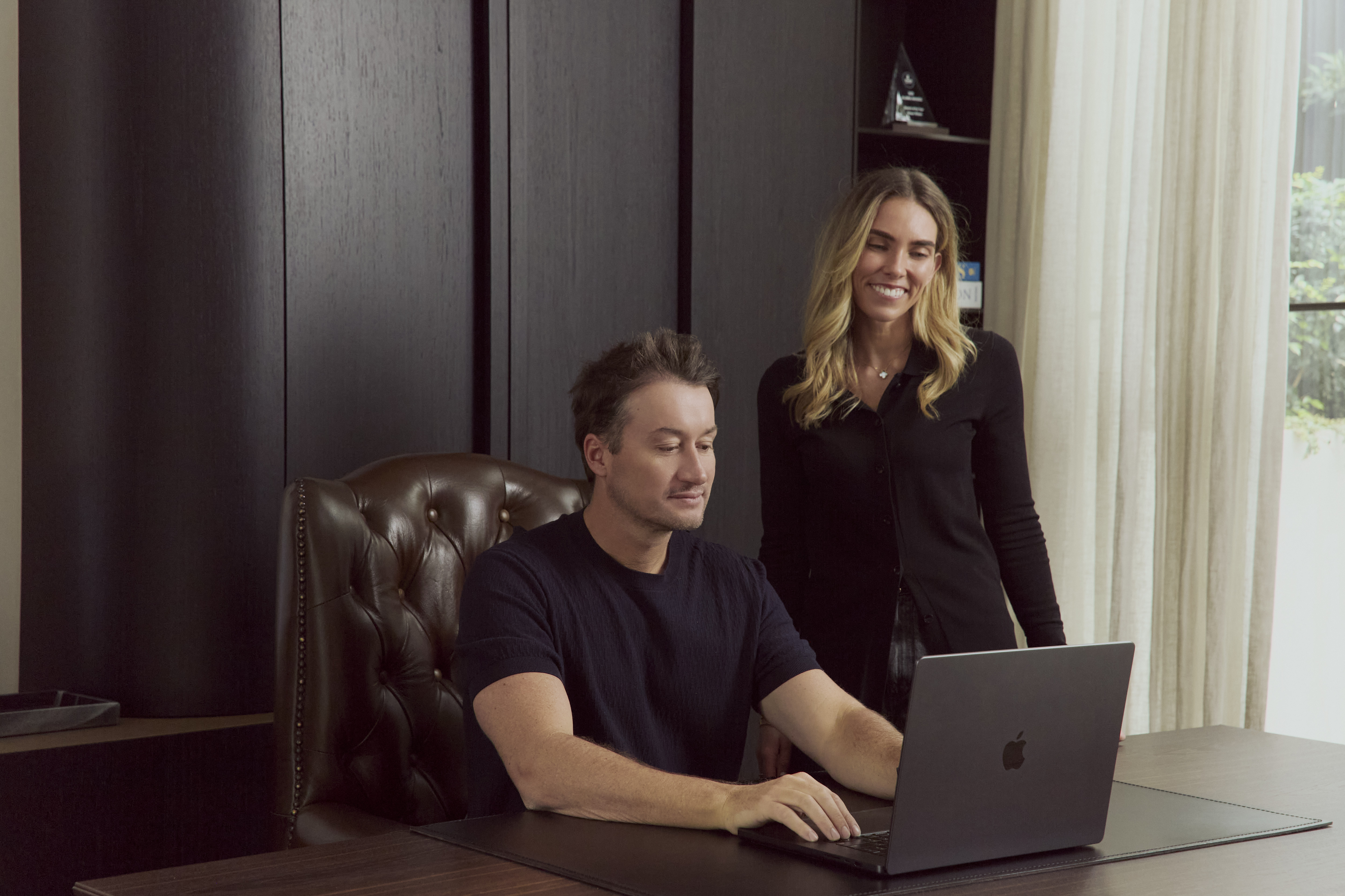 Shaun Wilson, Founder of Sol Rise Partners, working with a colleague